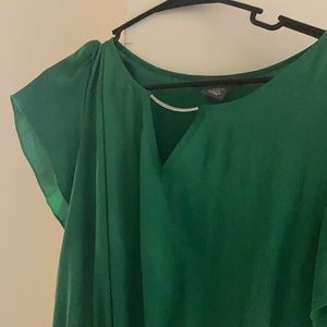 Green dress with jewelry neckline